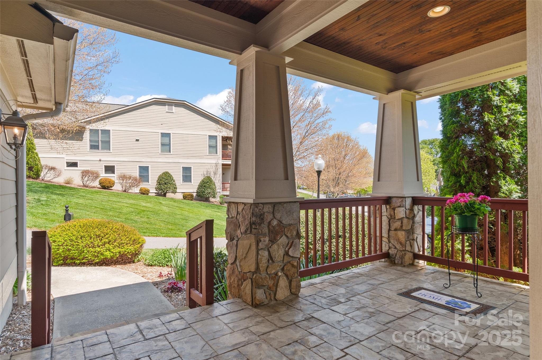 111 Augusta Circle Waynesville, NC 28786 - Photo 5 of 41 a view of a entrance gate of the house