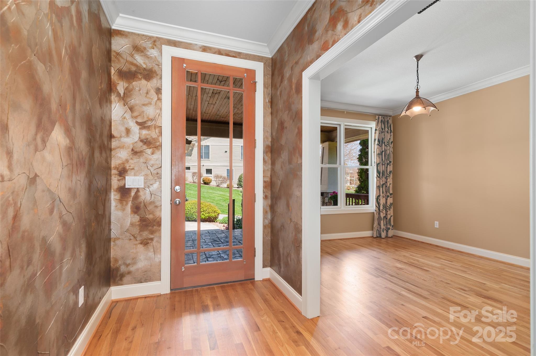111 Augusta Circle Waynesville, NC 28786 - Photo 7 of 41 a view of hallway with livingroom and wooden floor