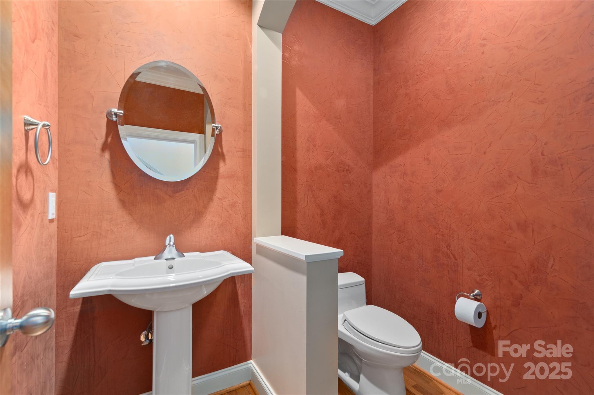 111 Augusta Circle Waynesville, NC 28786 - Photo 10 of 41 a bathroom with a sink a toilet and a mirror