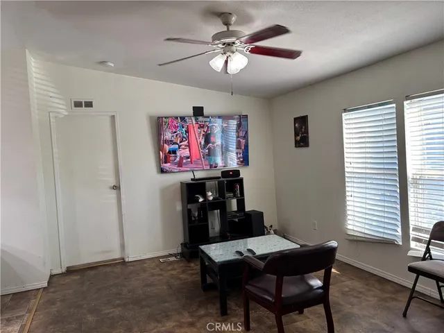 a view of a livingroom with furniture