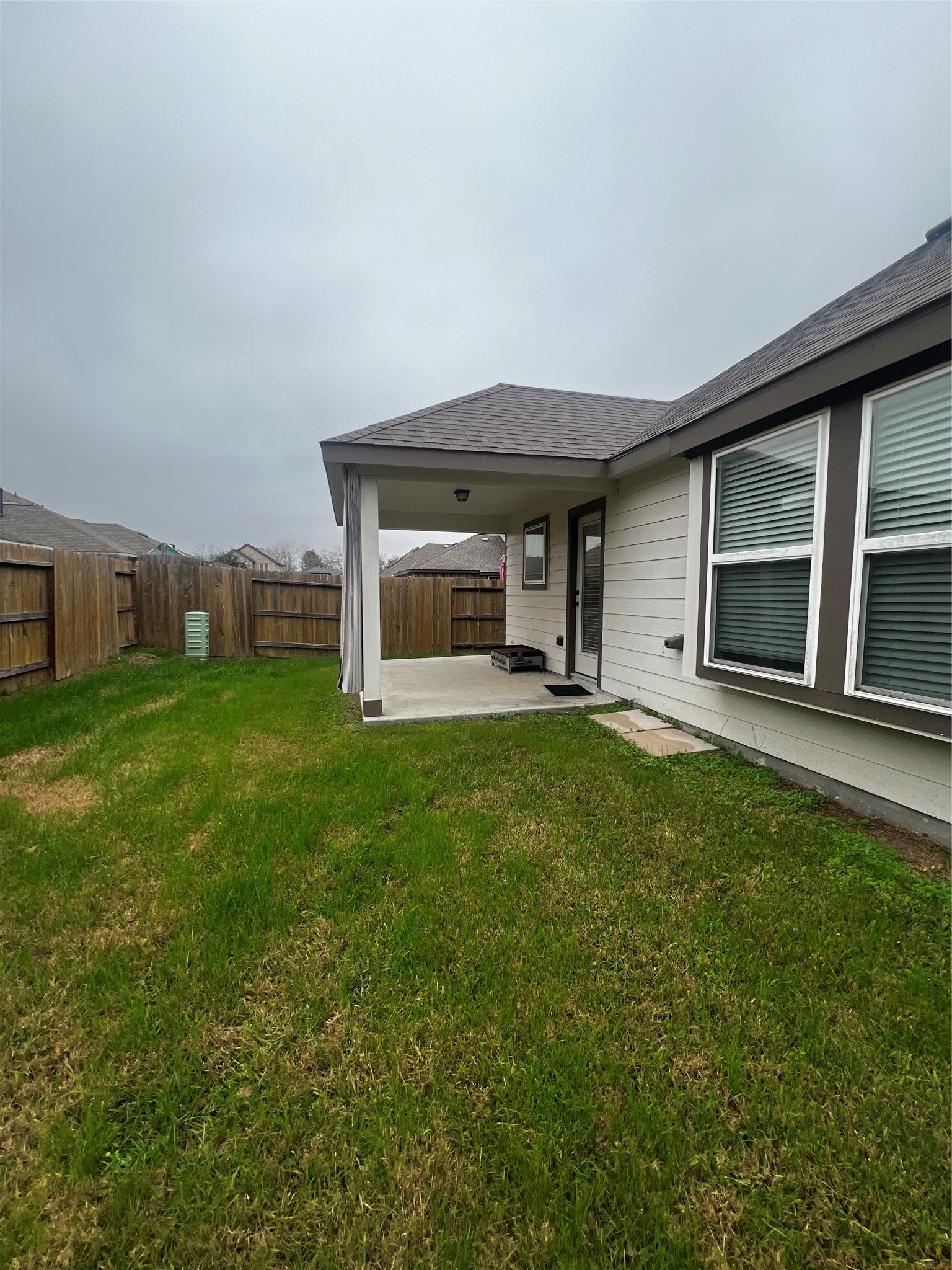 9214 Melmack Drive Rosharon, TX 77583 - Photo 13 of 14 front view of a house with a yard