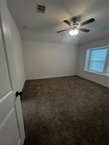 a bathroom with a double vanity sink mirror and shower
