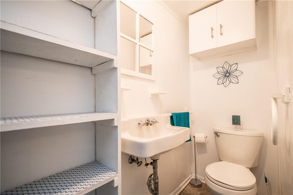 222 Ann Street McKees Rocks, PA 15136 - Photo 11 of 24 Powder room is conveniently located on the main level.