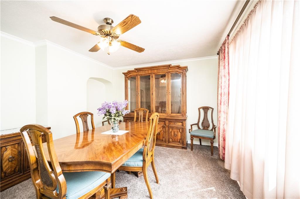 222 Ann Street McKees Rocks, PA 15136 - Photo 18 of 24 Alternate view of dining room with large picture window that streams in lots of light.