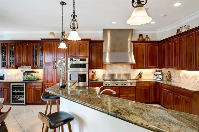 a kitchen with lots of counter space and a sink