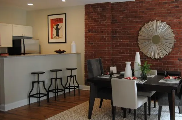 a view of a dining room with furniture
