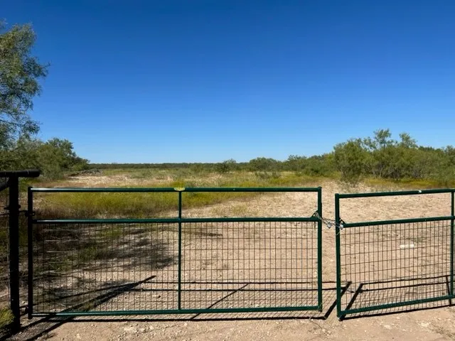 a view of lake and mountain in the background