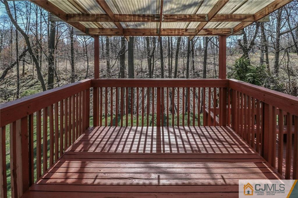 24 Ridge Road Edison, NJ 08817 - Photo 23 of 25 a view of a wooden deck