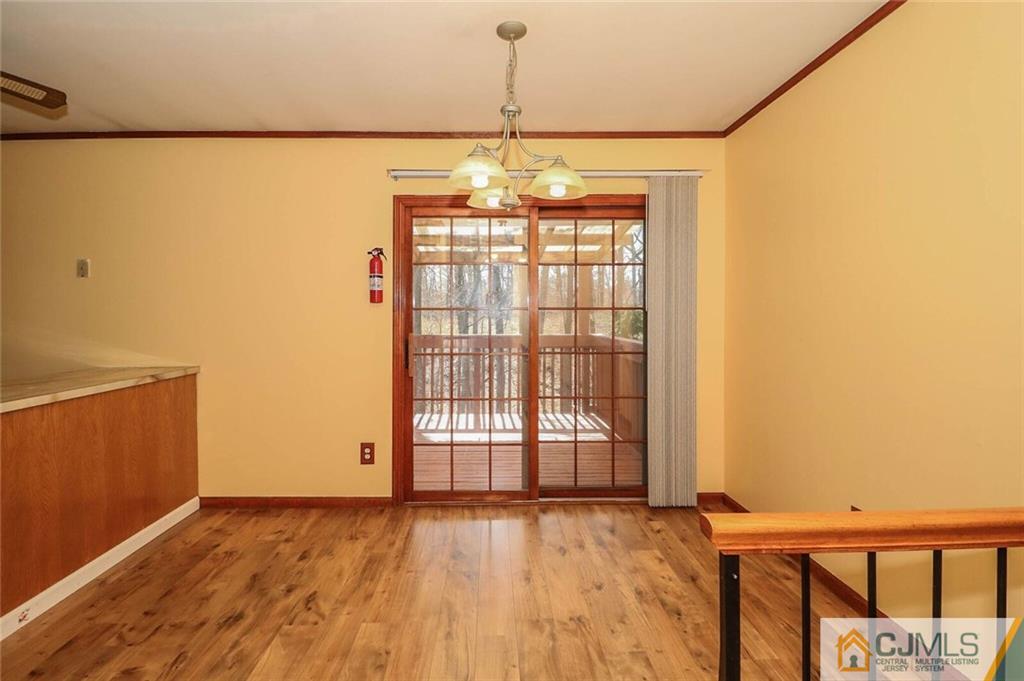 24 Ridge Road Edison, NJ 08817 - Photo 8 of 25 a view of an empty room with a window