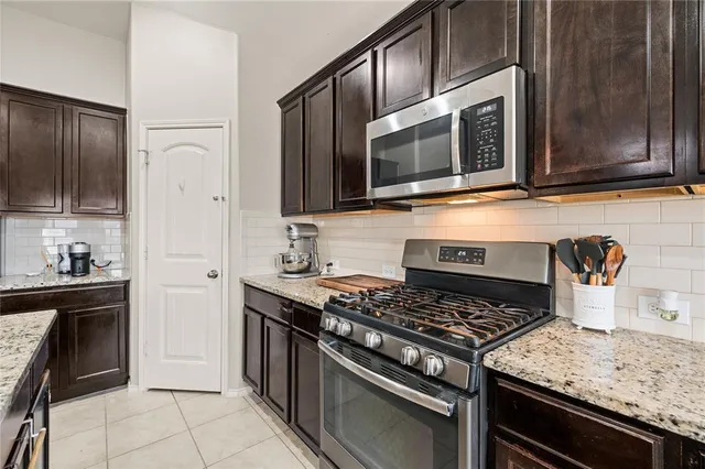 a bathroom with a double vanity sink mirror and double