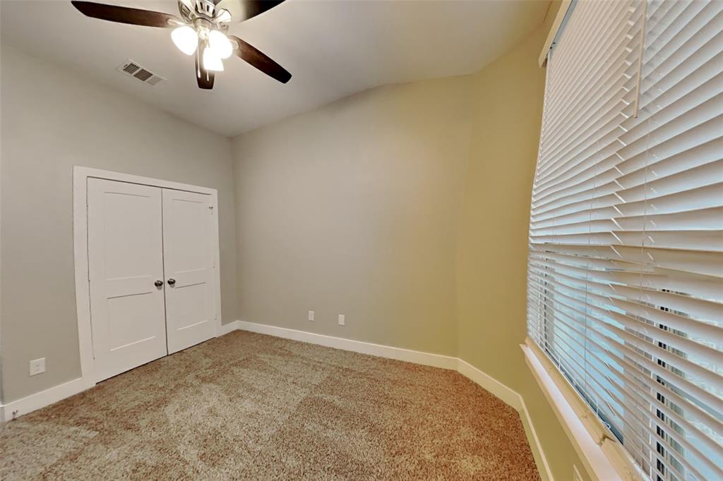 237 Giddings Trail Forney, TX 75126 - Photo 14 of 18 a view of an empty room and chandelier fan