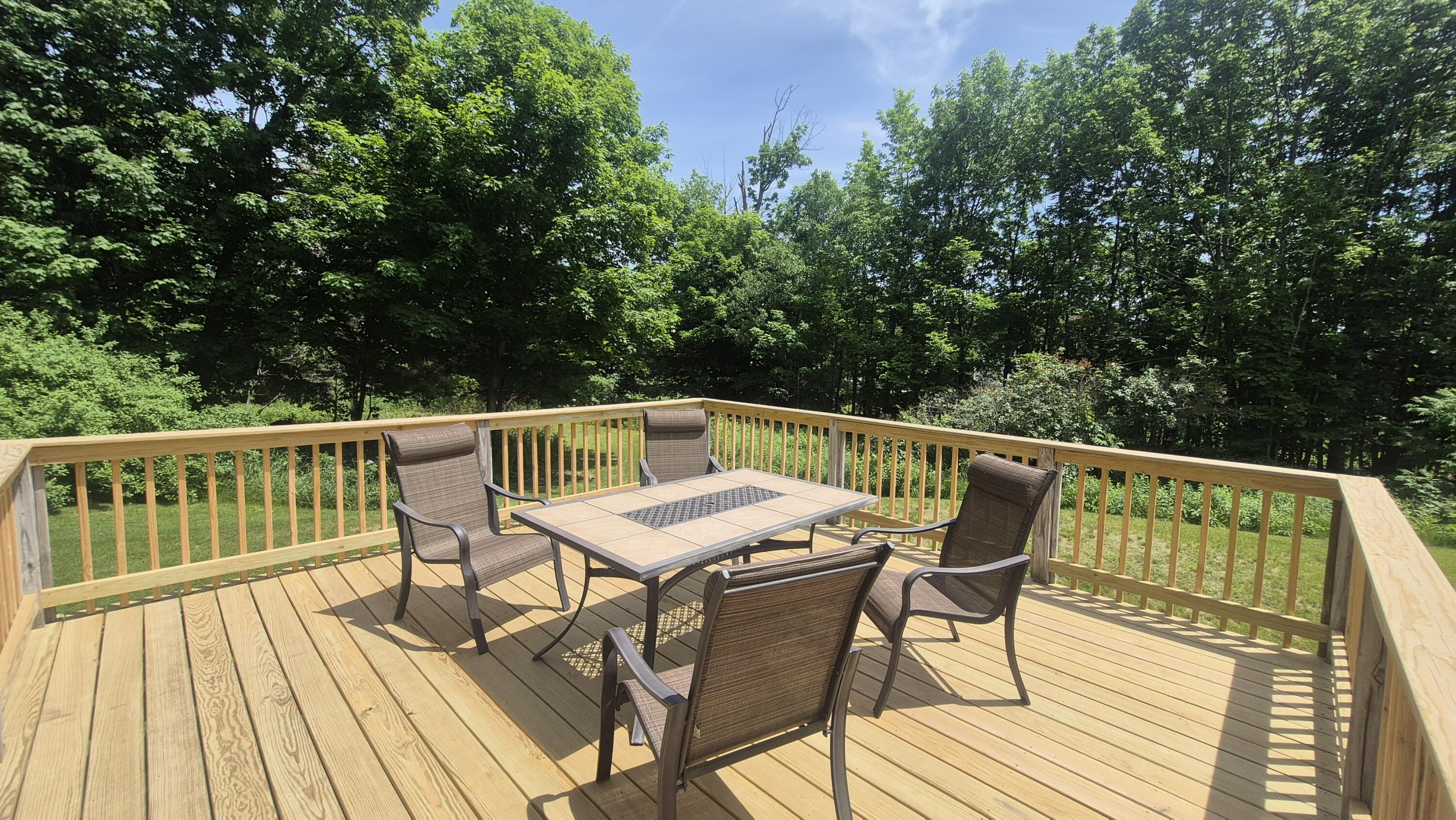 365 Hinckley Road Clinton, ME 04927 - Photo 28 of 31 28 New deck overlooking private backyard