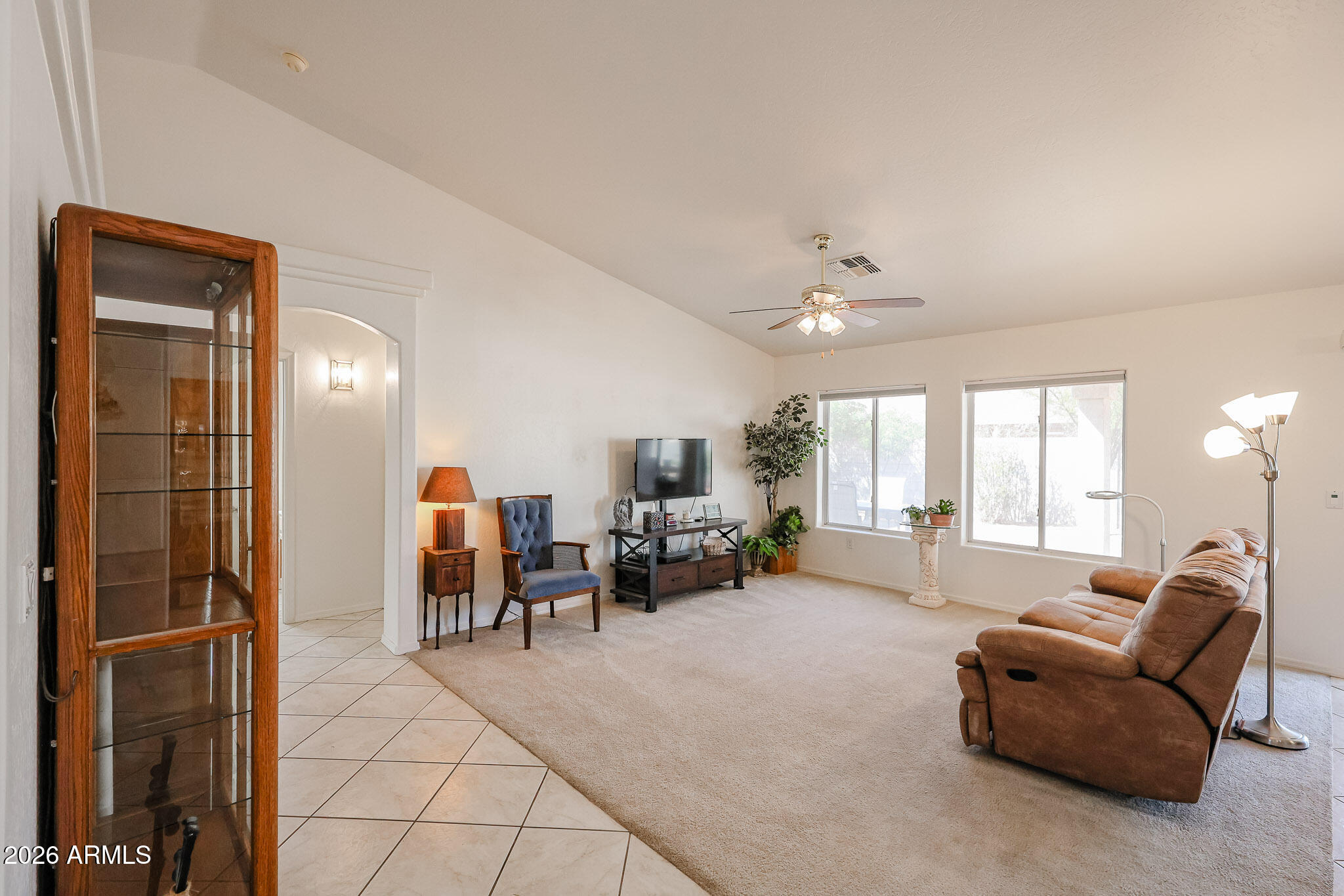 14980 South Capistrano Road Arizona City, AZ 85123 - Photo 5 of 39 a living room with furniture and a chandelier