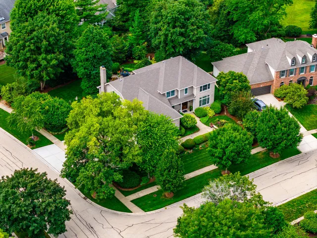 an aerial view of a house with garden