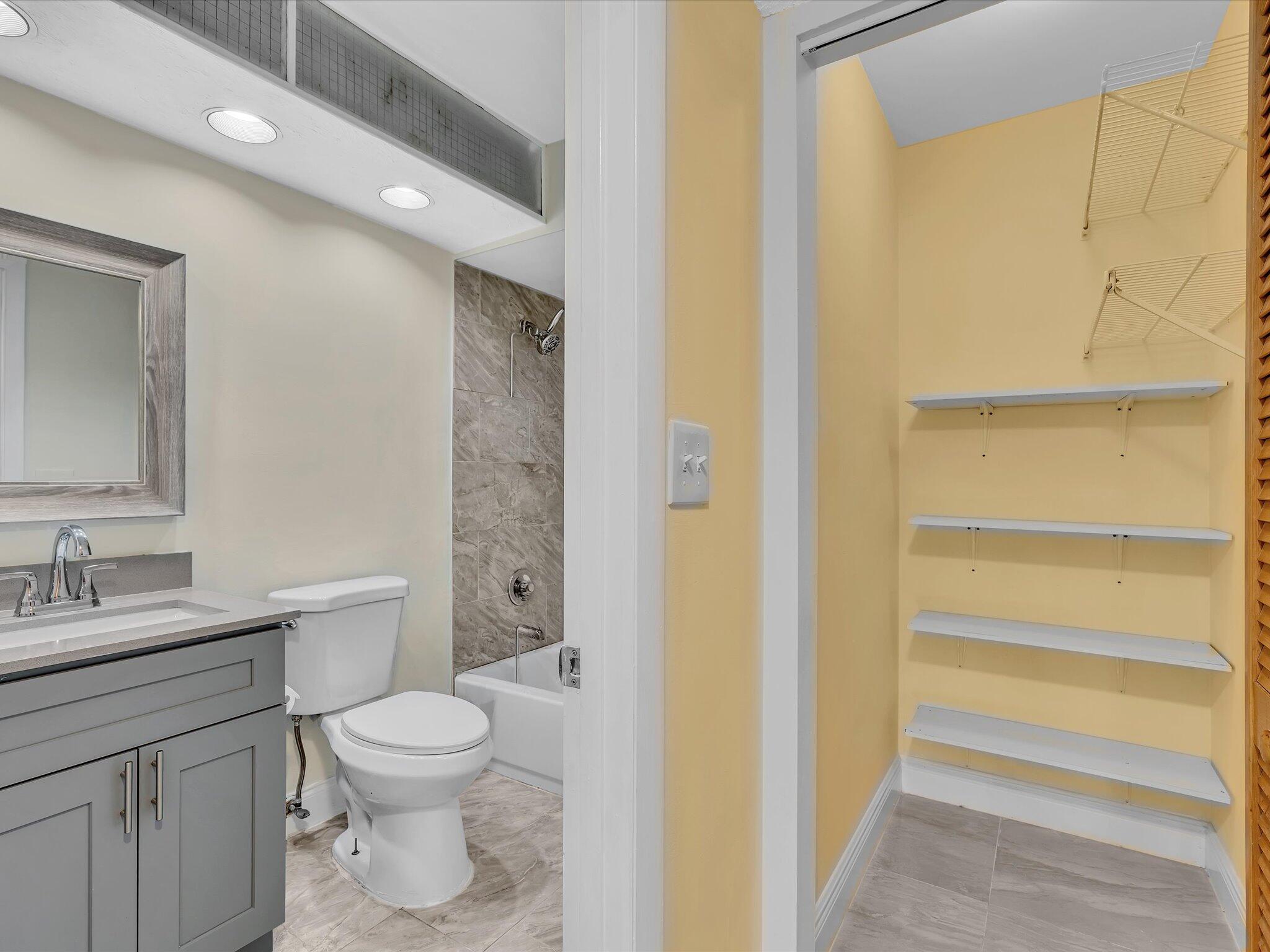 470 Northwest 20th Street, Unit 3020 Boca Raton, FL 33431 - Photo 25 of 43 Guest Bath Hall Closet