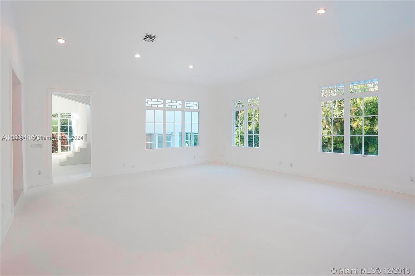 390 Gulf Road Key Biscayne, FL 33149 - Photo 13 of 25 an empty room with windows