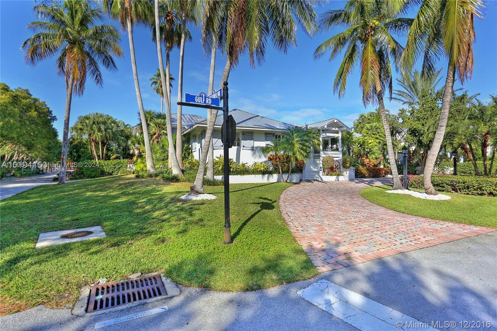 390 Gulf Road Key Biscayne, FL 33149 - Photo 2 of 25 a view of a park and palm trees