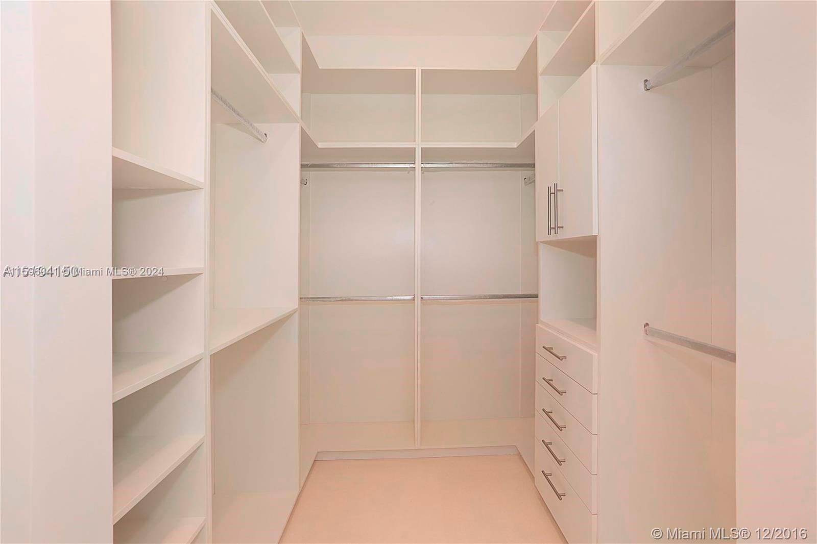 390 Gulf Road Key Biscayne, FL 33149 - Photo 22 of 25 a view of closet