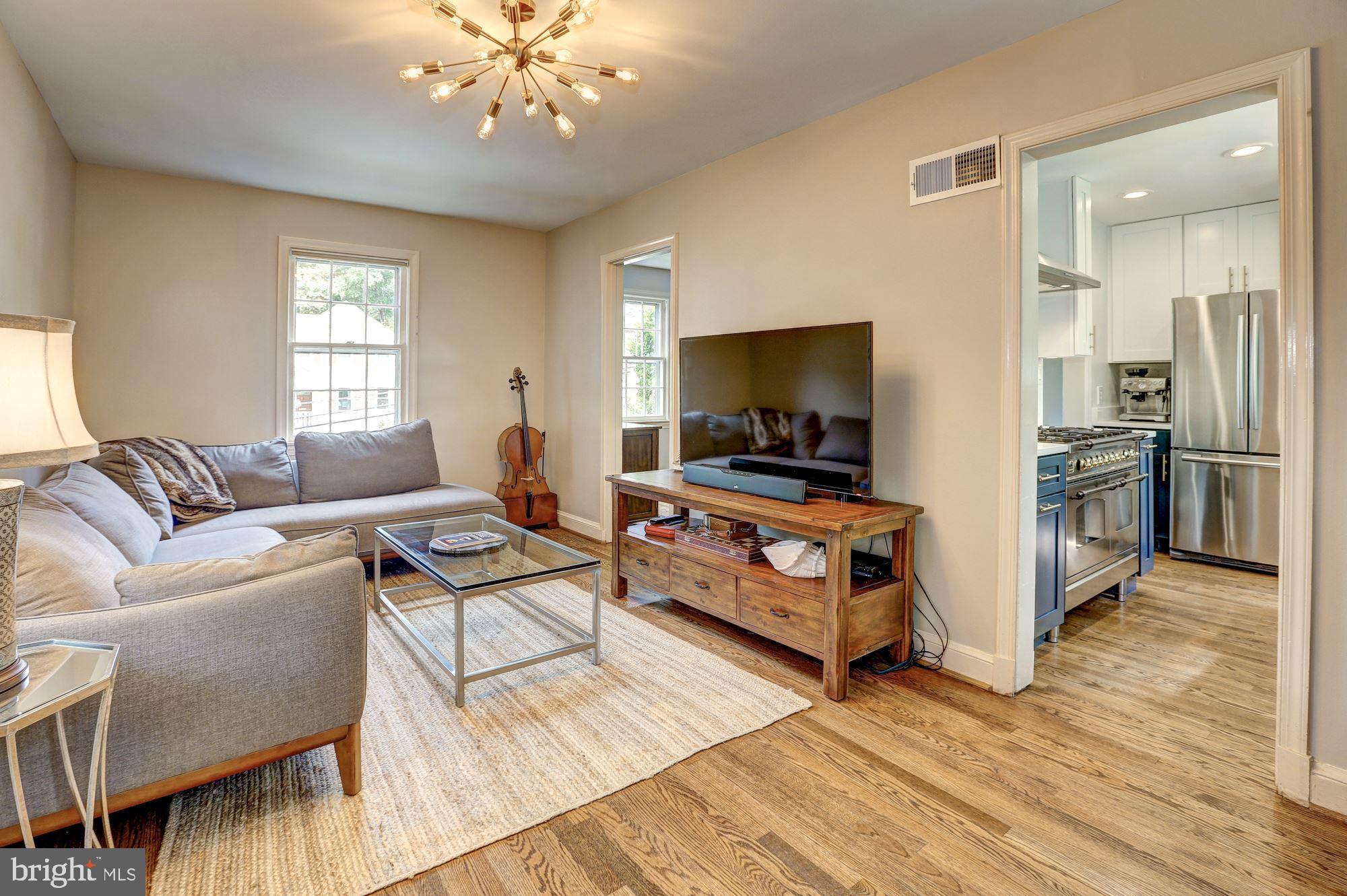 5908 Gloster Road Bethesda, MD 20816 - Photo 13 of 40 Family Room adjacent to Kitchen and Dining Room