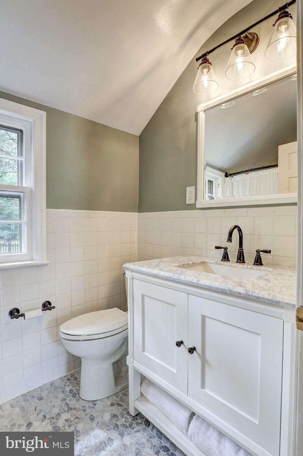 5908 Gloster Road Bethesda, MD 20816 - Photo 25 of 40 Bath #2 details, Carrara vanity and flooring