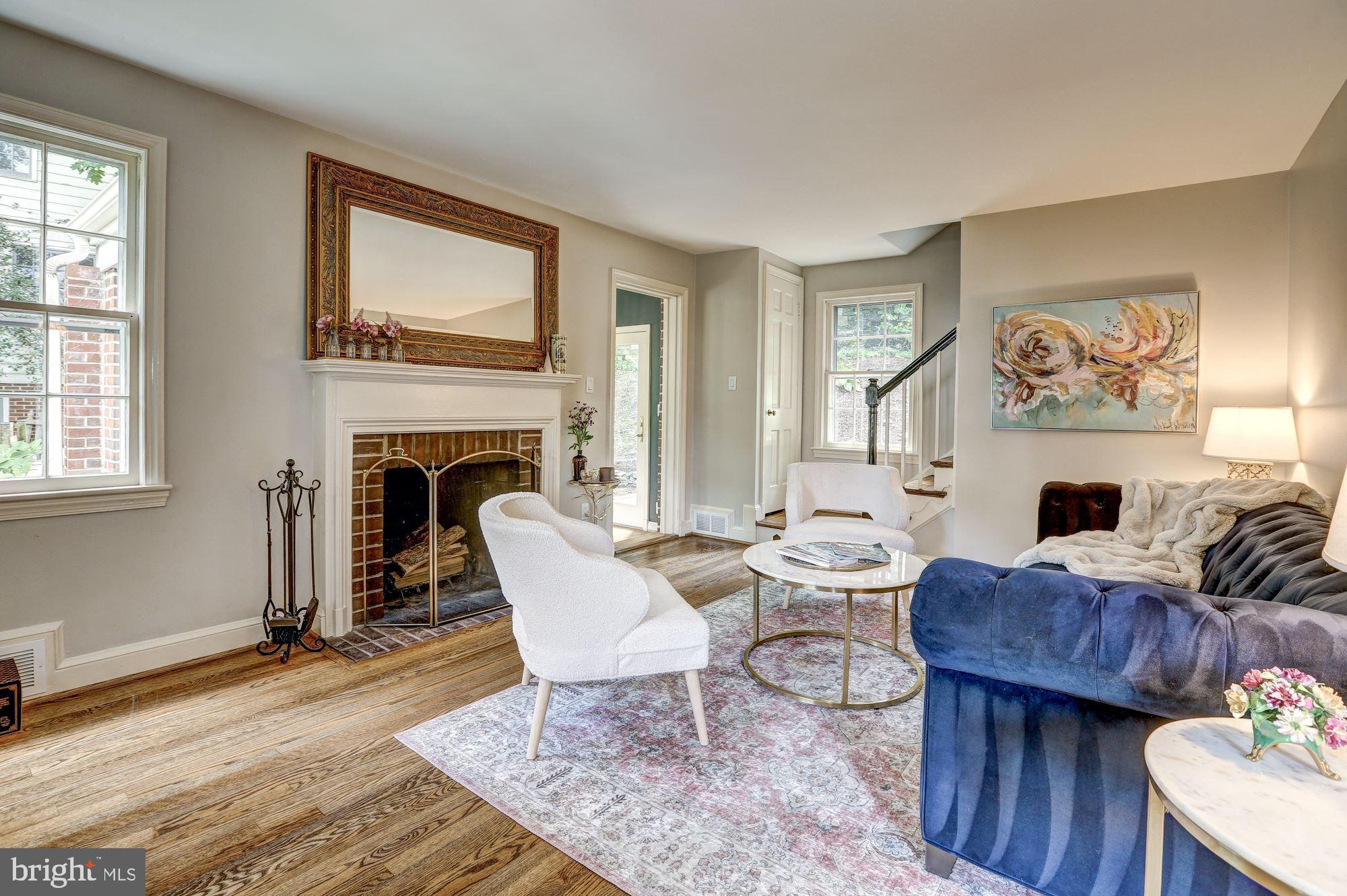 5908 Gloster Road Bethesda, MD 20816 - Photo 4 of 40 Wood burning fireplace, view towards sunlit office
