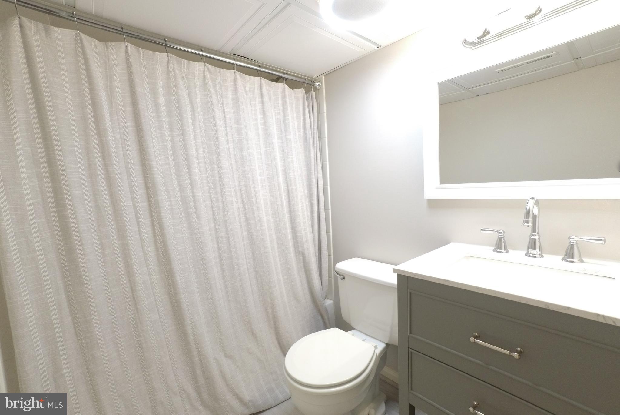 5908 Gloster Road Bethesda, MD 20816 - Photo 31 of 40 Lower level renovated full bath