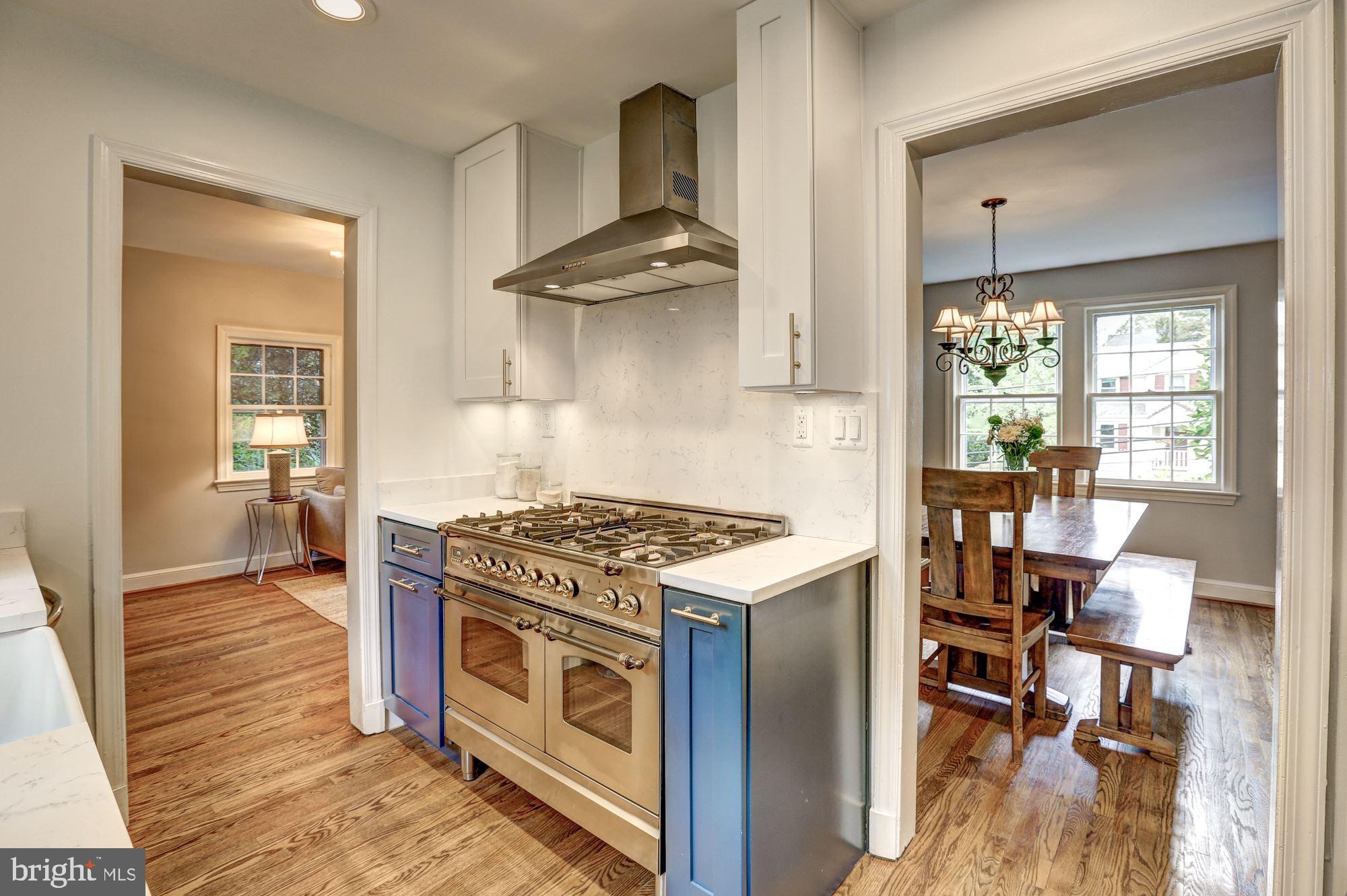 5908 Gloster Road Bethesda, MD 20816 - Photo 7 of 40 Hallman professional range, quarter countertops