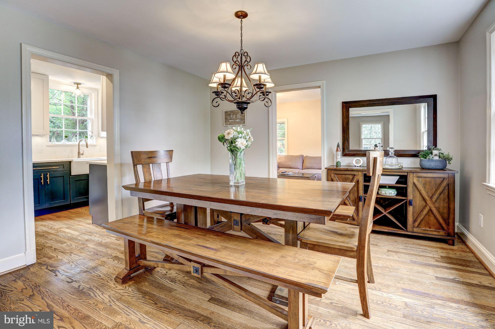 5908 Gloster Road Bethesda, MD 20816 - Photo 10 of 40 Dining Room opens to informal Family Room