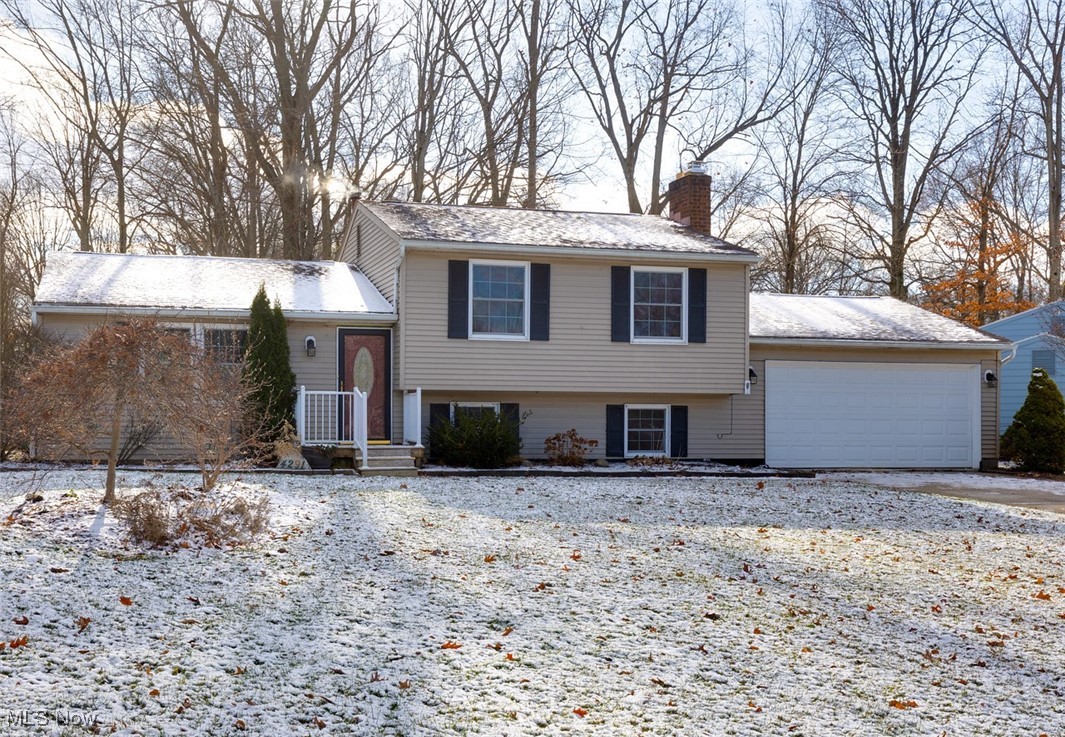 Tri-level home featuring a garage