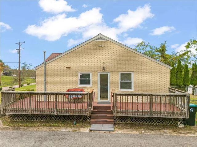 a view of a wooden fence