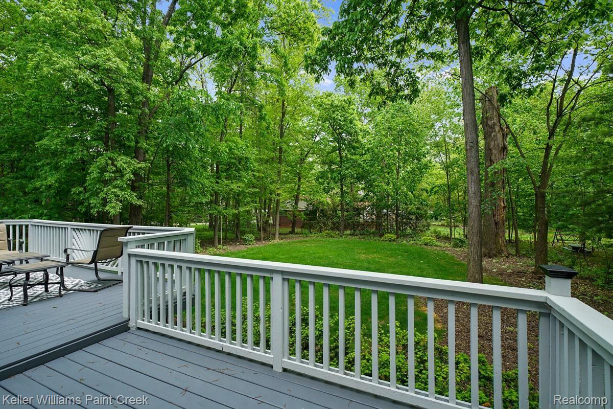 2641 Long Meadow Lane Rochester, MI 48307 - Photo 4 of 38 A great entertainment space in the Summer time! Huge deck overlooking the large yard with mature trees offering privacy.