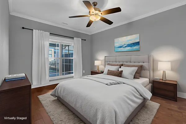 a bedroom with a bed and a desk