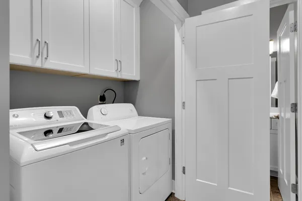 a utility room with dryer and washer