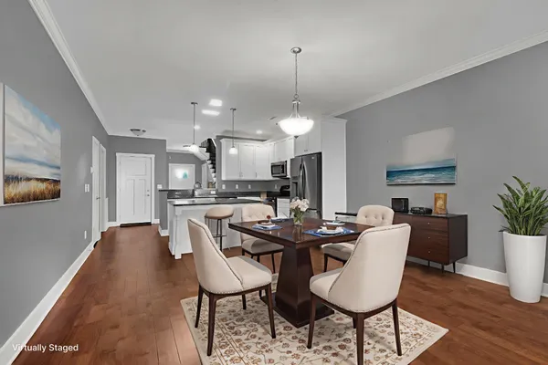 a view of a dining room with furniture