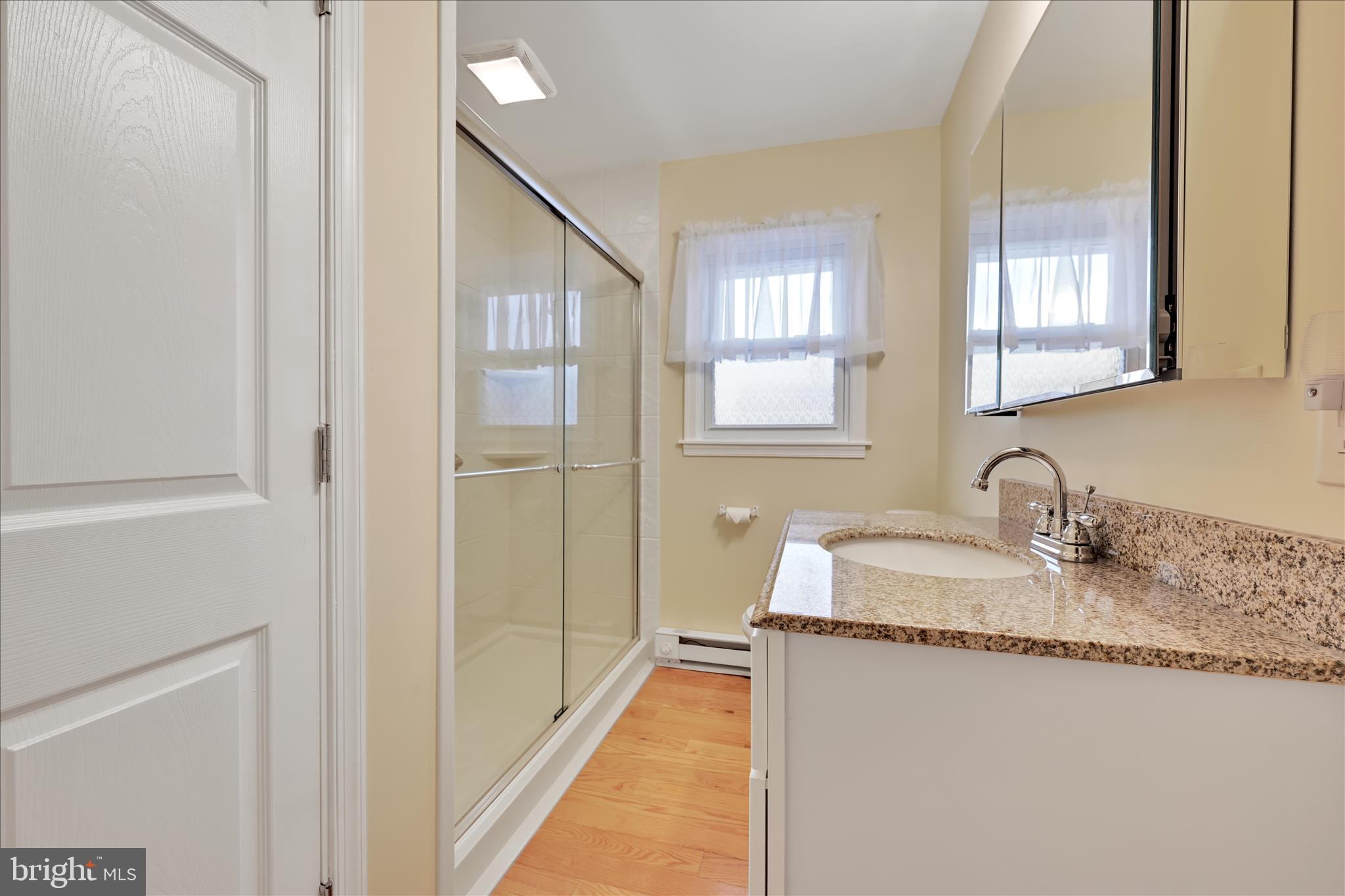 1931 South Forge Road Palmyra, PA 17078 - Photo 15 of 29 a en suite bathroom with a granite countertop sink and a mirror