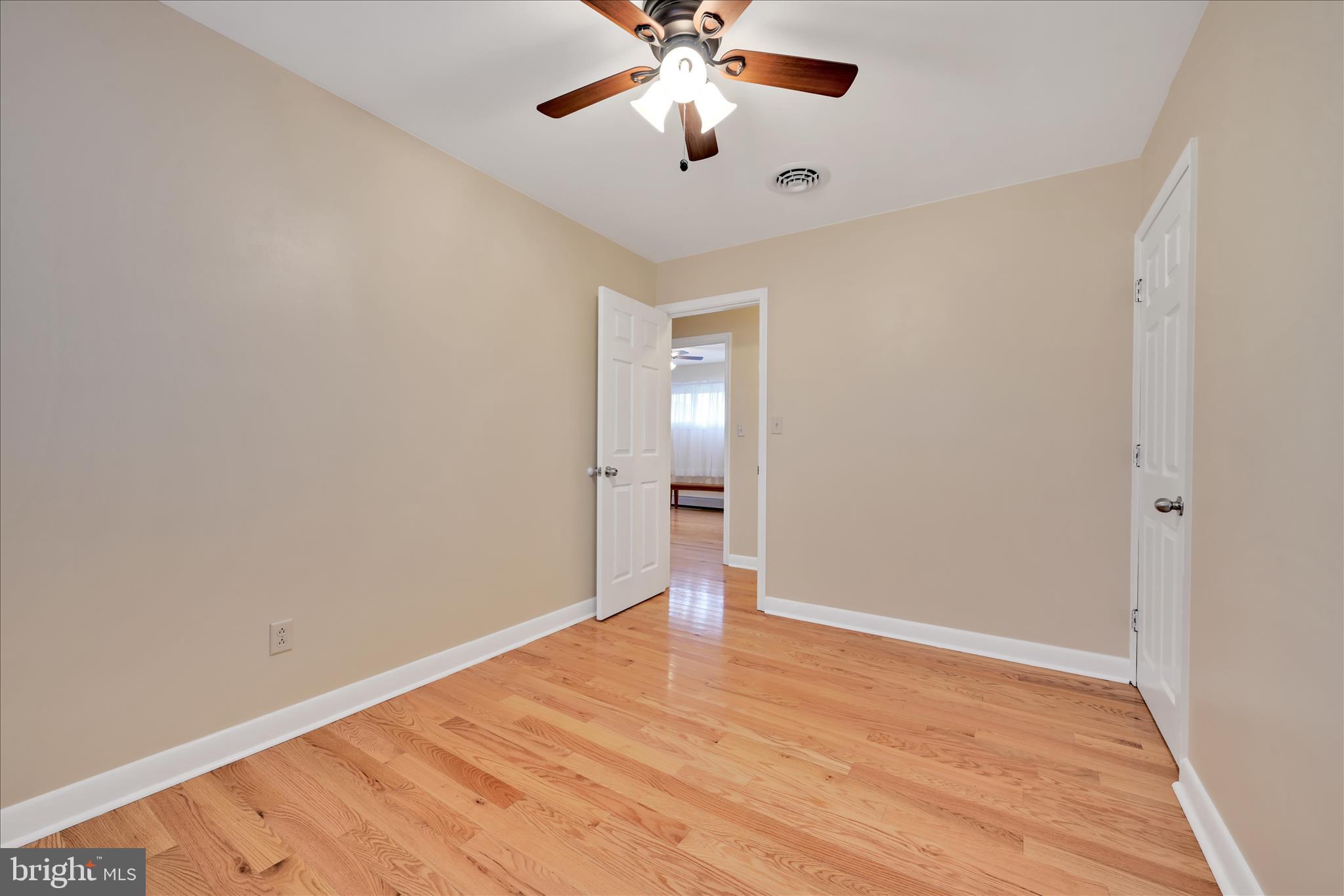 1931 South Forge Road Palmyra, PA 17078 - Photo 17 of 29 a view of an empty room with window and wooden floor