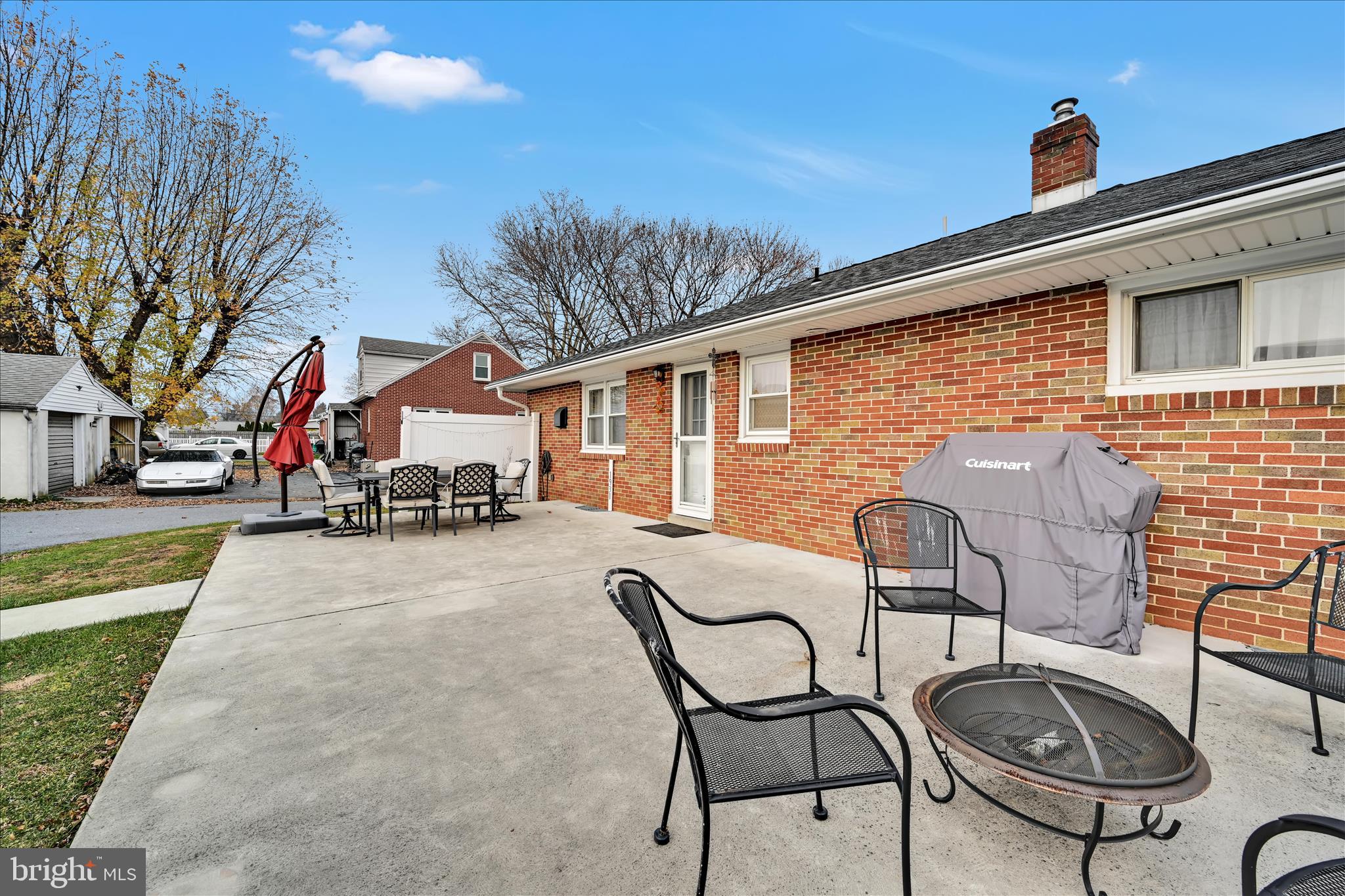 1931 South Forge Road Palmyra, PA 17078 - Photo 21 of 29 a view of a patio with table and chairs with wooden floor and fence