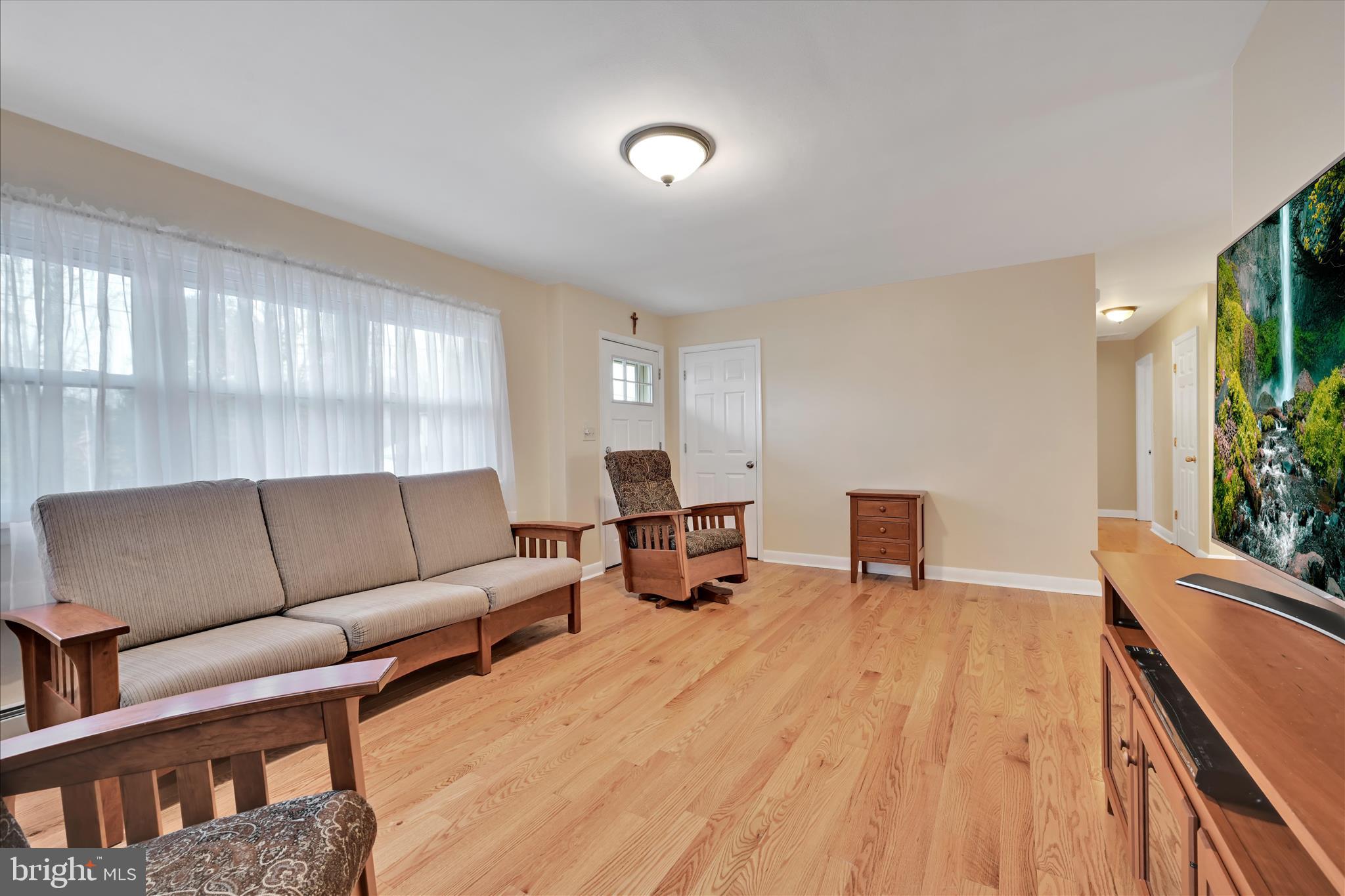 1931 South Forge Road Palmyra, PA 17078 - Photo 5 of 29 a living room with furniture and a potted plant