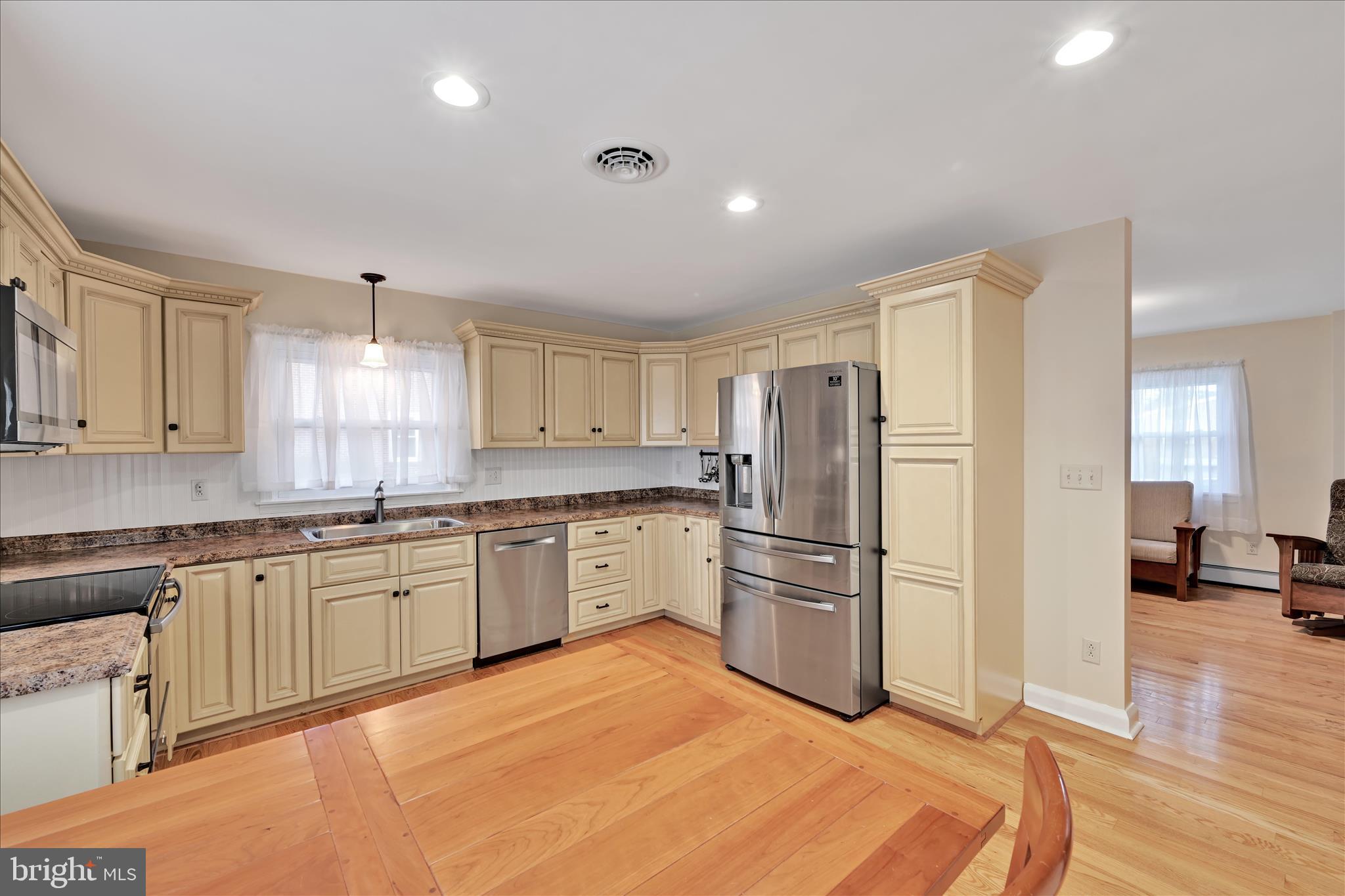 1931 South Forge Road Palmyra, PA 17078 - Photo 7 of 29 a kitchen with stainless steel appliances granite countertop a refrigerator and a stove top oven