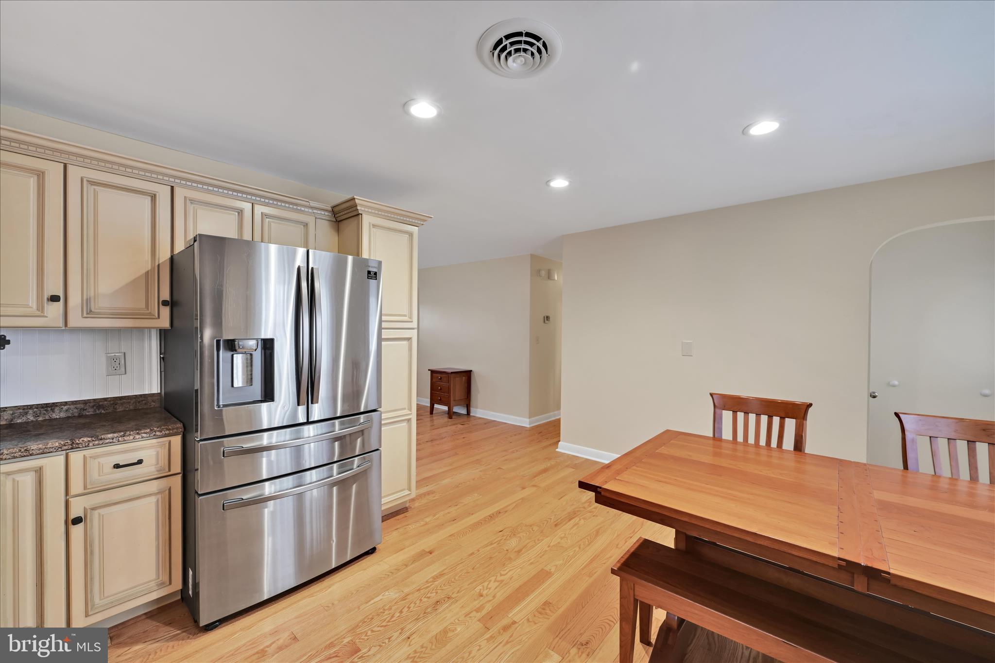 1931 South Forge Road Palmyra, PA 17078 - Photo 10 of 29 a kitchen with stainless steel appliances a refrigerator a stove a sink dishwasher with a dining table and chair