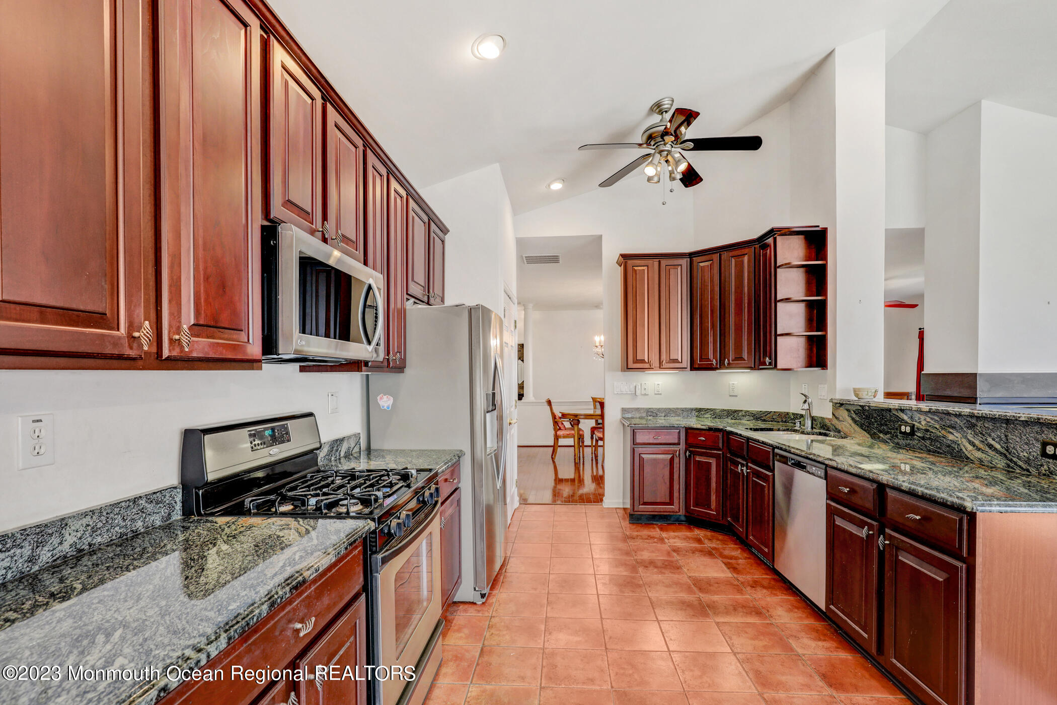 12 Vecchio Road Manchester Township, NJ 08759 - Photo 15 of 35 a kitchen with stainless steel appliances granite countertop a stove and a sink