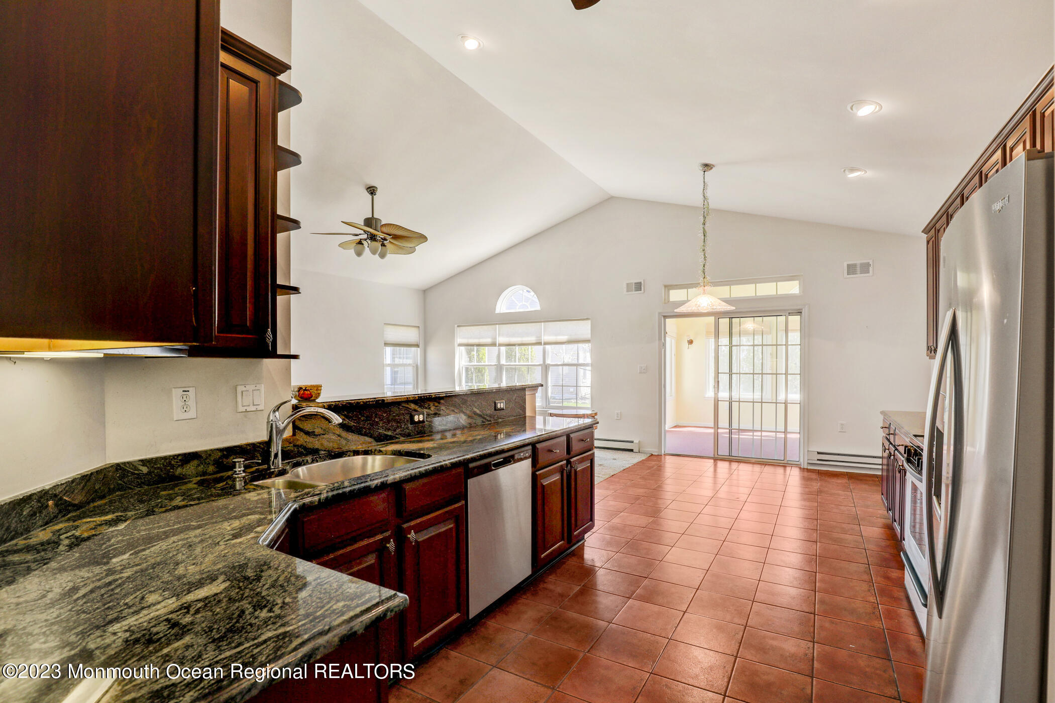 12 Vecchio Road Manchester Township, NJ 08759 - Photo 16 of 35 a kitchen with stainless steel appliances granite countertop a sink stove and refrigerator