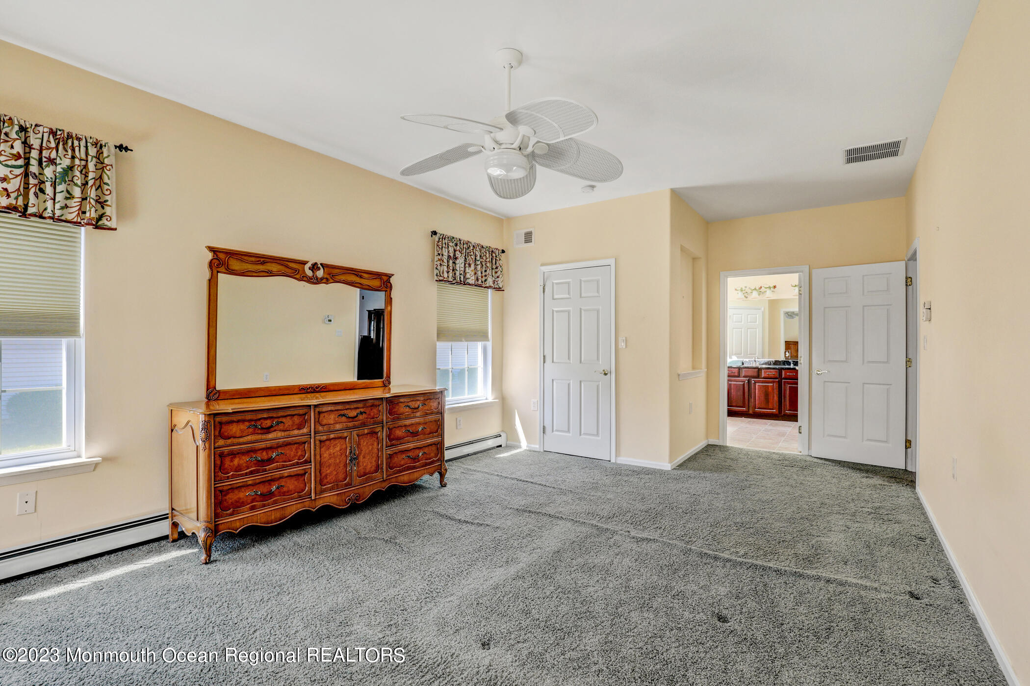 12 Vecchio Road Manchester Township, NJ 08759 - Photo 20 of 35 a view of an empty room with window and cabinet