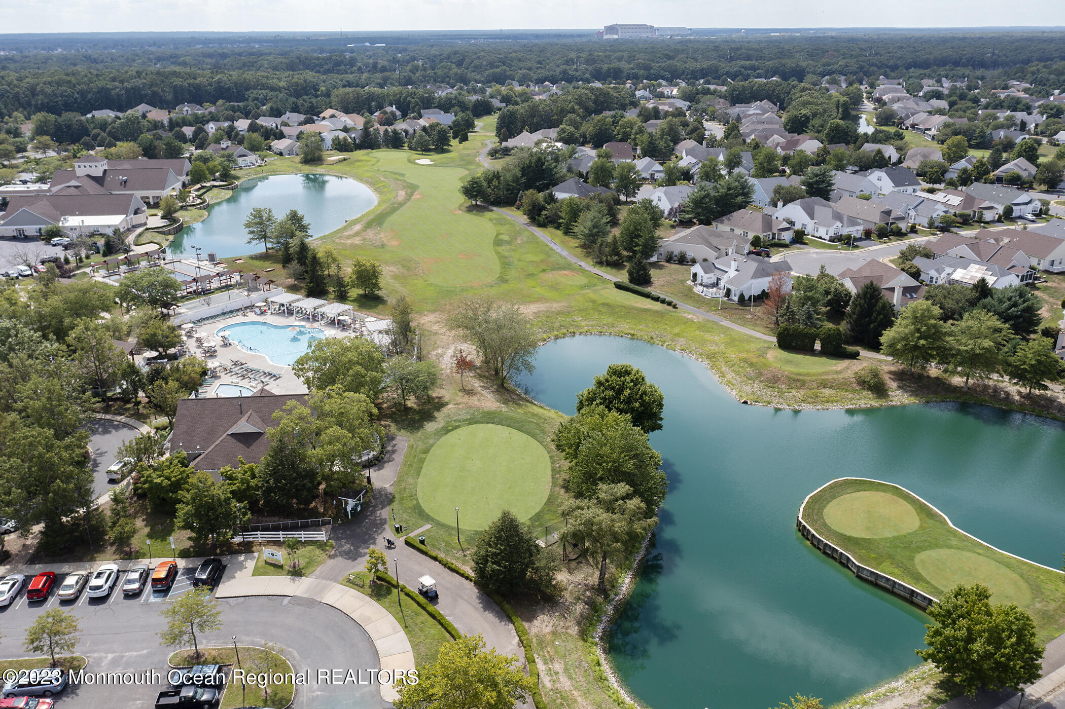 12 Vecchio Road Manchester Township, NJ 08759 - Photo 30 of 35 an aerial view of a house with a swimming pool yard and outdoor seating