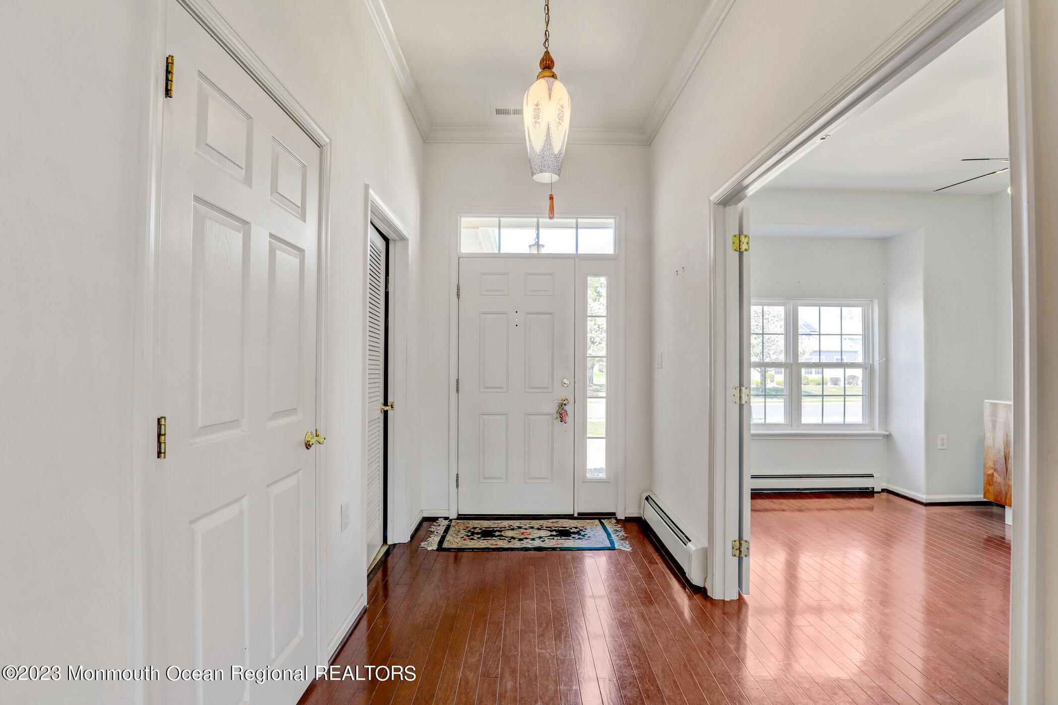 12 Vecchio Road Manchester Township, NJ 08759 - Photo 4 of 35 a view of a room with wooden floor and window