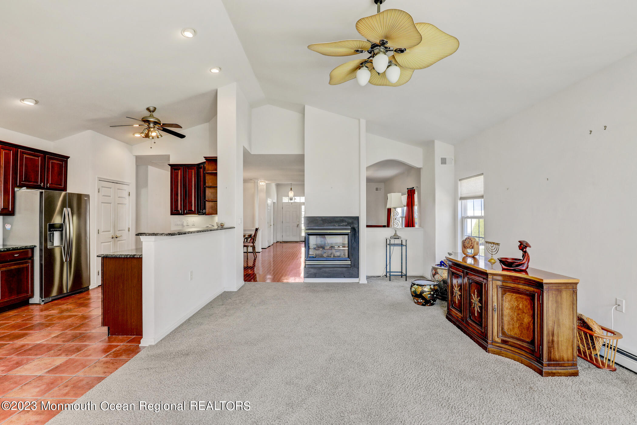 12 Vecchio Road Manchester Township, NJ 08759 - Photo 10 of 35 a living room with furniture and a flat screen tv