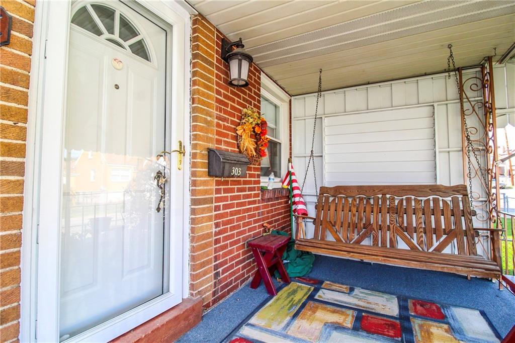 303 Wright Street McKees Rocks, PA 15136 - Photo 3 of 25 Covered front porch for enjoying your morning coffee!