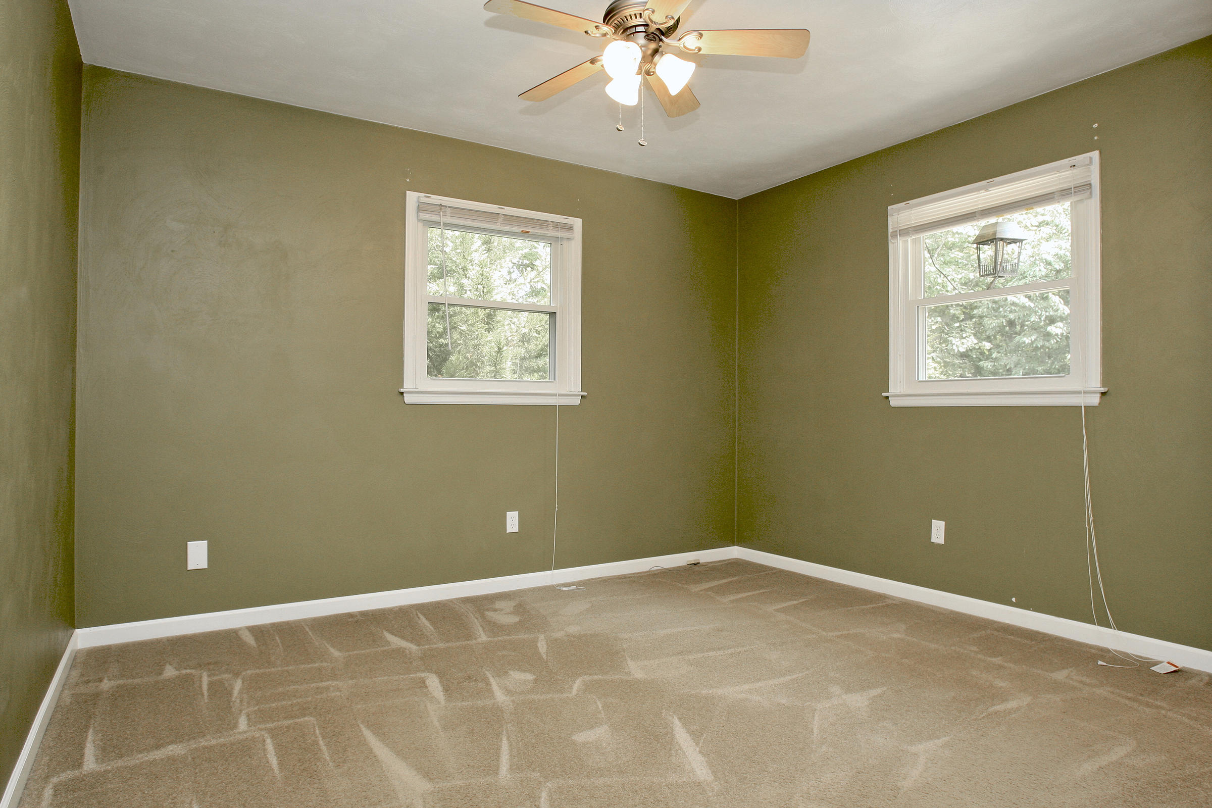2960 Eton Road Hardy, VA 24101 - Photo 15 of 43 a view of an empty room with a window and a chandelier fan