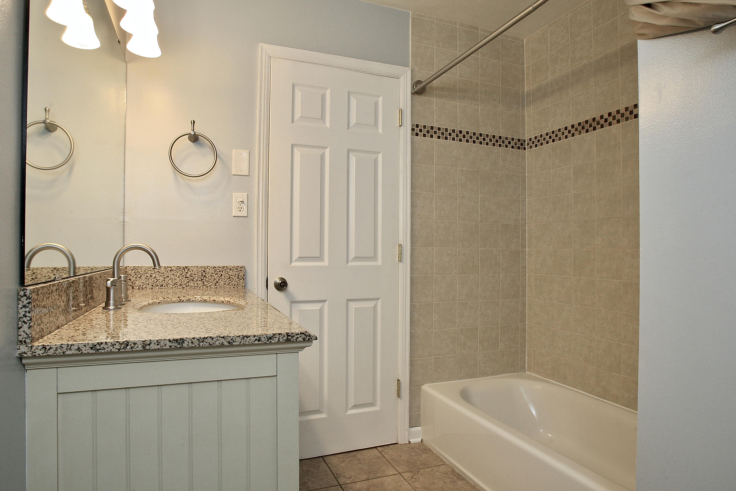 2960 Eton Road Hardy, VA 24101 - Photo 20 of 43 a bathroom with a granite countertop sink and a mirror a bathtub