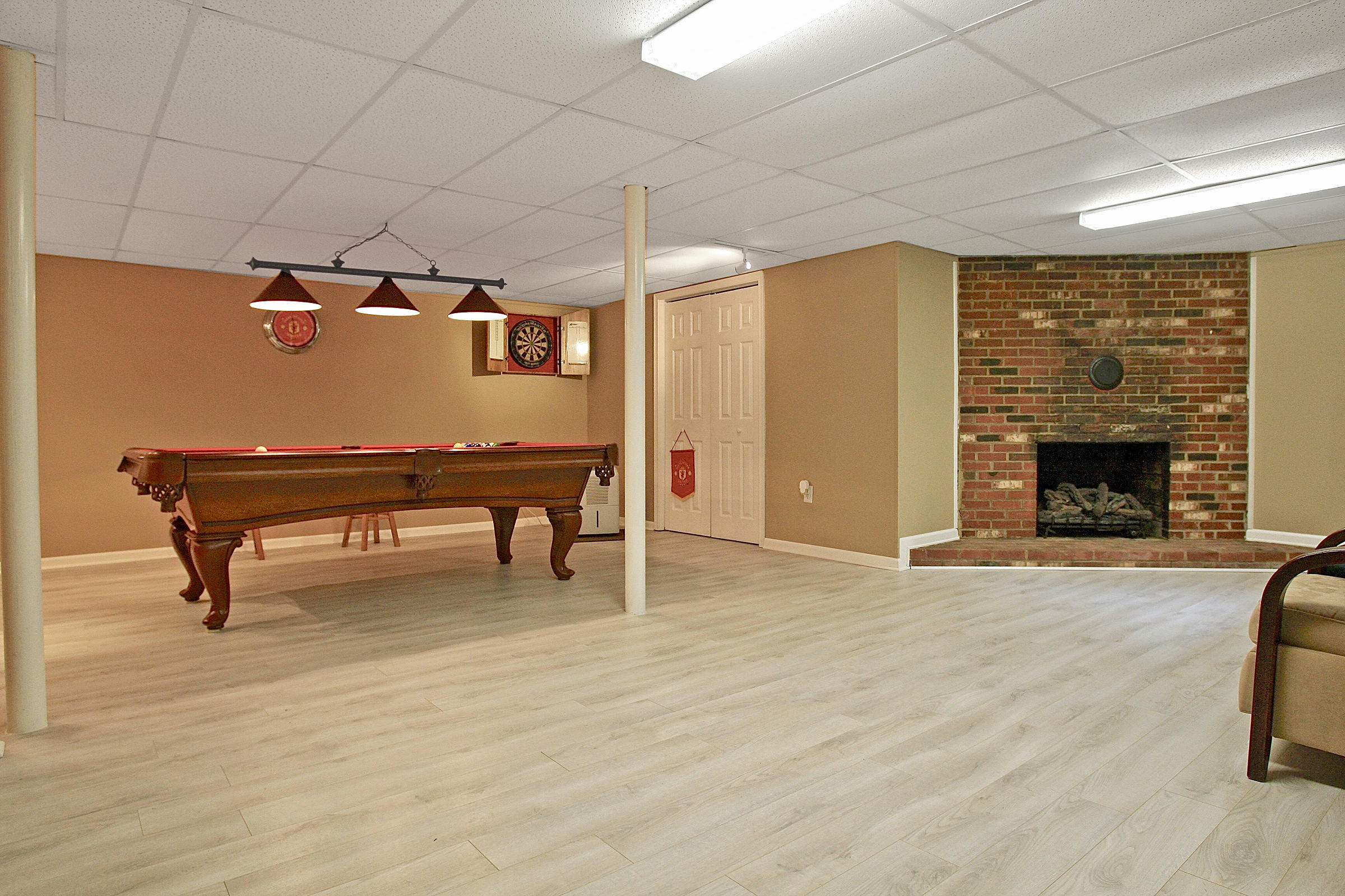 2960 Eton Road Hardy, VA 24101 - Photo 24 of 43 an empty room with windows a fireplace and wooden floor
